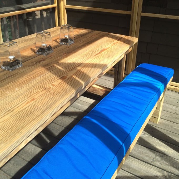 Outdoor custom bench cushion made with blue Sunbrella fabric